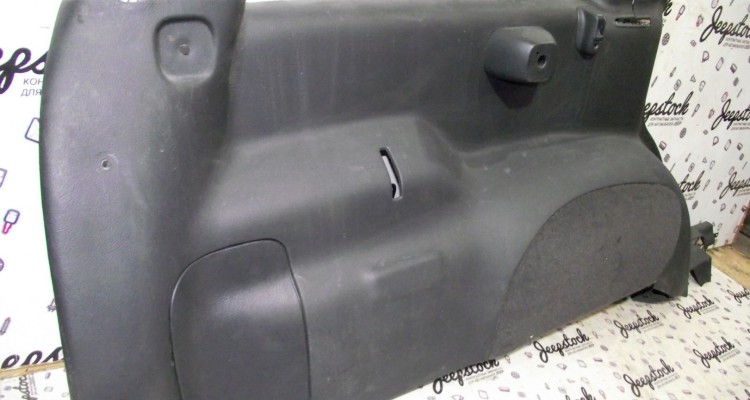 Боковина багажника левая (Agate) дефект Jeep Grand Cherokee ZG-ZJ, оригинальный номер производителя OEM Боковина багажника левая (Agate) дефект