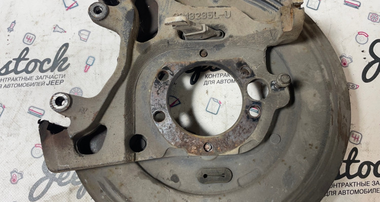 Опорный щит задний тормозной левый Jeep Grand Cherokee ZG-ZJ, оригинальный номер производителя 04796343, 04762129, 04796337 OEM Опорный щит задний тормозной левый