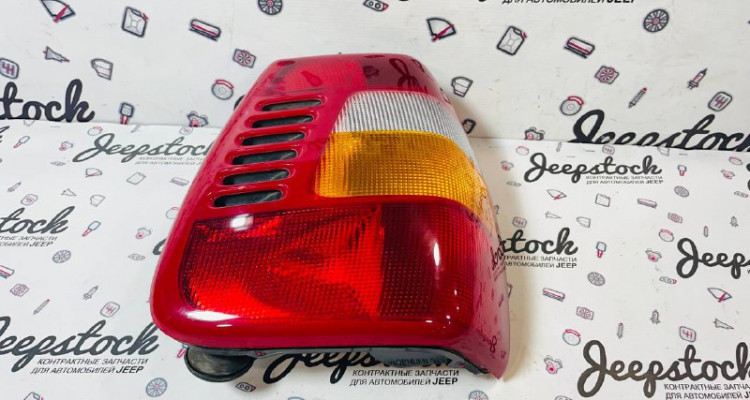 Фонарь задний левый (дефект) Jeep Grand Cherokee WG-WJ, оригинальный номер производителя 55155143AC OEM Фонарь задний правый Jeep Grand Cherokee WG-WJ