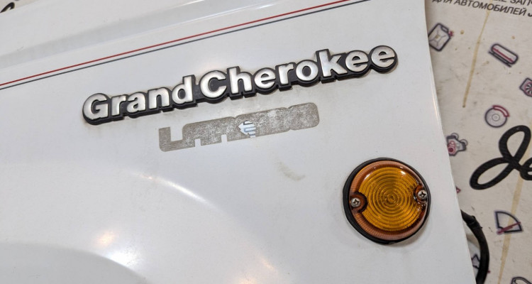 Крыло переднее левое Laredo (зеленый) Jeep Grand Cherokee ZG-ZJ, оригинальный номер производителя 55031835 OEM Крыло переднее левое Laredo (белое)