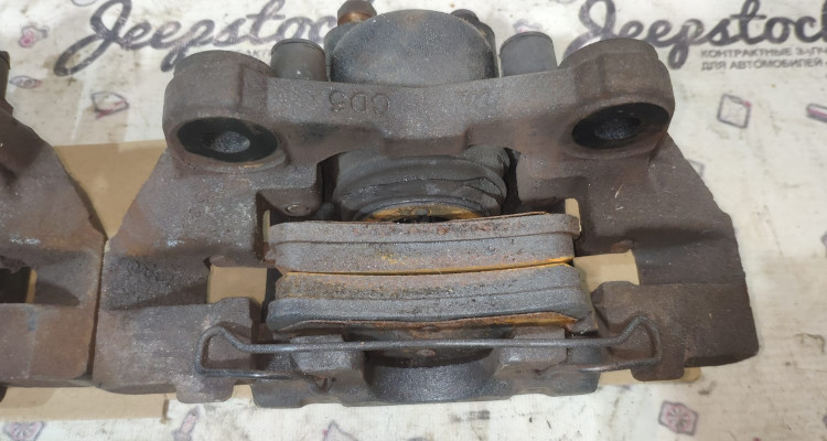 Суппорта задние (пара) Jeep Grand Cherokee WG-WJ, оригинальный номер производителя 05011975AA05011974AA OEM Суппорта задние (пара)