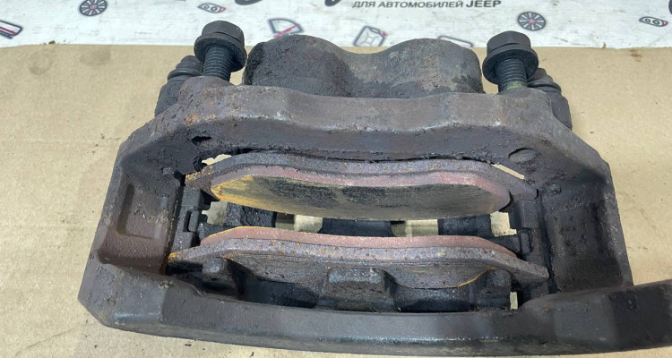  Суппорт тормозной передний левый Dodge Ram 3 DR