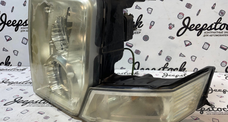  Фара левая Jeep Commander XK-XH