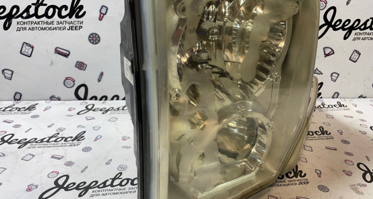  Фара левая Jeep Commander XK-XH