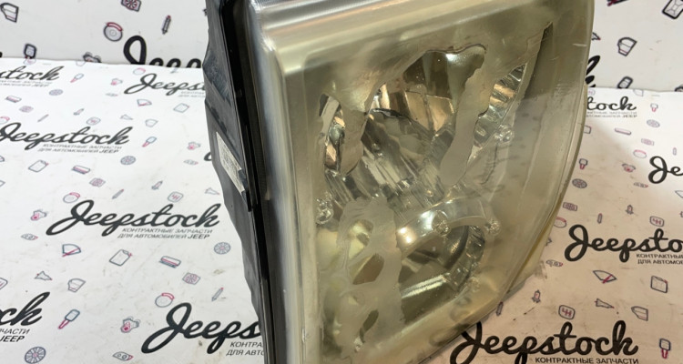  Фара левая Jeep Commander XK-XH